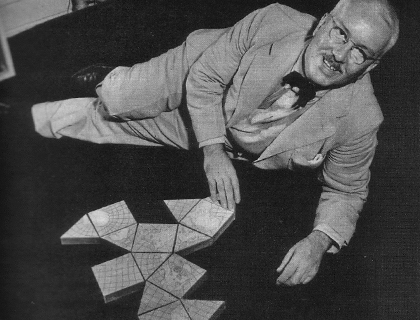 Buckminster Fuller on Floor with early Dymaxion map